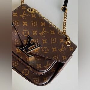 LV crossbody 
Not Authentic